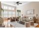 Cozy living room with high ceilings, and an abundance of natural light at 450 Riverwalk, Mcdonough, GA 30252