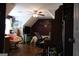 A view of the bedroom showcasing a ceiling fan, window and wood flooring at 405 Mallory Cir, Loganville, GA 30052