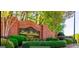 Inviting community entrance with a brick sign and well-manicured landscaping at 405 Mallory Cir, Loganville, GA 30052