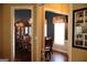 A view of the dining room from through doorways at 405 Mallory Cir, Loganville, GA 30052