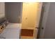 A bright laundry room with white appliances and a tile floor provides convenience and functionality at 405 Mallory Cir, Loganville, GA 30052