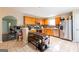 Modern kitchen featuring stainless steel appliances, ample counter space, and tile floors, ideal for cooking at 2545 Lake Royale Dr, Riverdale, GA 30296