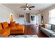 Bright and airy living room with hardwood flooring and neutral walls, perfect for entertaining guests at 2545 Lake Royale Dr, Riverdale, GA 30296