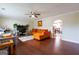 Comfortable living room featuring hardwood floors, recessed lights, and a ceiling fan, ideal for relaxation at 2545 Lake Royale Dr, Riverdale, GA 30296