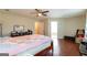 Spacious main bedroom with hardwood floors and a walk-in closet at 2545 Lake Royale Dr, Riverdale, GA 30296
