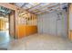 Unfinished basement with exposed framing and walls, ready for customization at 500 Barrington Farms Pkwy, Sharpsburg, GA 30277