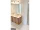 Bathroom featuring a double vanity with great lighting and a large mirror at 500 Barrington Farms Pkwy, Sharpsburg, GA 30277