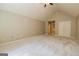 Spacious bedroom features neutral carpeting, a closet, and a ceiling fan at 500 Barrington Farms Pkwy, Sharpsburg, GA 30277