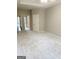 Bedroom featuring neutral colored carpet and doors leading to other rooms at 500 Barrington Farms Pkwy, Sharpsburg, GA 30277