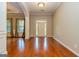 Inviting home foyer featuring hardwood floors and a bright entrance at 500 Barrington Farms Pkwy, Sharpsburg, GA 30277