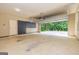 Spacious two-car garage with ample storage space and an automatic door opener at 500 Barrington Farms Pkwy, Sharpsburg, GA 30277