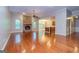 Bright living room with hardwood floors and a stone fireplace, perfect for gatherings at 500 Barrington Farms Pkwy, Sharpsburg, GA 30277