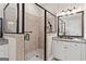 Modern bathroom features a glass shower with tile surround and granite vanity at 406 Horizon Trl, Canton, GA 30114