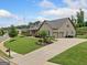 Beautifully landscaped home with large driveway and two car garage at 406 Horizon Trl, Canton, GA 30114