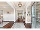 Elegant foyer with hardwood floors, white trim, and a view into the living room at 406 Horizon Trl, Canton, GA 30114