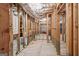 Unfinished basement with exposed piping and unfinished framing at 4595 Carriage Walk Ln, Cumming, GA 30040