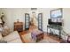 Cozy living room area showcasing a warm rug and an entry to a hallway at 4595 Carriage Walk Ln, Cumming, GA 30040