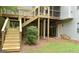 Two-story deck attached to the home, providing outdoor access and entertainment space at 219 Brown Branch Rd, Locust Grove, GA 30248