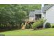 Beautiful backyard with a multi-level deck, providing ample outdoor living and entertaining space at 219 Brown Branch Rd, Locust Grove, GA 30248