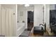 Bathroom with tub, vessel sink, wood counter, and walk-in closet with custom storage at 219 Brown Branch Rd, Locust Grove, GA 30248
