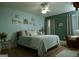 Cozy bedroom with calm paint, natural light, and hardwood floors at 219 Brown Branch Rd, Locust Grove, GA 30248