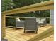 Outdoor deck with stylish seating area, perfect for entertaining guests or enjoying serene moments at 219 Brown Branch Rd, Locust Grove, GA 30248