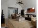 Spacious living room featuring vaulted ceilings, wood floors, and comfortable seating at 219 Brown Branch Rd, Locust Grove, GA 30248