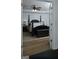 Bright main bedroom featuring hardwood floors, neutral tones, and a tranquil setting at 219 Brown Branch Rd, Locust Grove, GA 30248