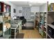Office with crafting space, computer station, shelving, storage, and laminate floors at 219 Brown Branch Rd, Locust Grove, GA 30248