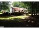 Expansive backyard featuring a spacious deck, perfect for entertaining and outdoor relaxation at 85 Pine Haven Dr, Carrollton, GA 30116