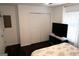 Bedroom with hardwood floors, closet doors and natural lighting at 85 Pine Haven Dr, Carrollton, GA 30116