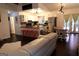 A bright, open kitchen and living area with stainless steel appliances and eat-in counter at 85 Pine Haven Dr, Carrollton, GA 30116