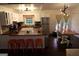 Bright kitchen featuring an island with seating, wooden countertops and stainless steel appliances at 85 Pine Haven Dr, Carrollton, GA 30116