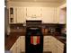 Functional kitchen with wooden countertops, ample cabinet space, and modern appliances at 85 Pine Haven Dr, Carrollton, GA 30116