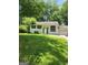 Charming one-story home featuring a spacious front yard and an attached garage at 6485 Boca Grande Blvd, Forest Park, GA 30297