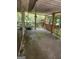 Covered back porch with wooden railings and support columns at 6485 Boca Grande Blvd, Forest Park, GA 30297