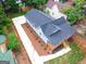 New construction home featuring a driveway, wooden deck and landscaped backyard at 809 Dill Sw Ave, Atlanta, GA 30310