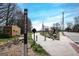 View of the Atlanta Beltline with a paved trail, landscaping, and street at 809 Dill Sw Ave, Atlanta, GA 30310