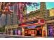 The iconic Fox Theatre featuring a bright red sign, detailed architecture, and a vibrant marquee at 809 Dill Sw Ave, Atlanta, GA 30310