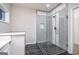 Bathroom with tiled shower, glass door, and modern finishes at 809 Dill Sw Ave, Atlanta, GA 30310