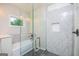 Bathroom with a glass shower, soaking tub and stylish tile work at 809 Dill Sw Ave, Atlanta, GA 30310
