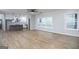 Inviting living space flowing into the kitchen, highlighting natural light and open floor plan at 809 Dill Sw Ave, Atlanta, GA 30310