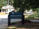 Perkerson Park sign along the road with a quaint home in the background at 809 Dill Sw Ave, Atlanta, GA 30310