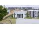 Welcome to Tyler Perry Studios entrance with a white building and gate at 809 Dill Sw Ave, Atlanta, GA 30310