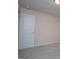 Bedroom featuring neutral carpet and white door at 411 Hopi Ln, Villa Rica, GA 30180