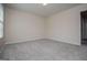 Neutral carpeted bedroom featuring clean lines and plenty of open space at 411 Hopi Ln, Villa Rica, GA 30180