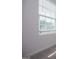 Window featuring bright light and blinds in an interior residential room at 411 Hopi Ln, Villa Rica, GA 30180