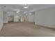 Finished basement area featuring neutral carpet, recessed lighting, and an open layout at 821 Carnellian Ln, Peachtree City, GA 30269