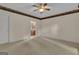 Empty bedroom showcasing a patterned wallpaper border at 821 Carnellian Ln, Peachtree City, GA 30269