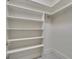 Walk-in closet with shelving at 821 Carnellian Ln, Peachtree City, GA 30269